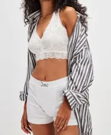 Bóxer blanco estilo masculino con cintura elástica con logo 'We The Free'.