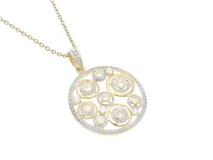 Dije circular de plata 925 con baño de oro y circonias.