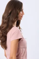 Remera de manga corta y cuello redondo, color verde menta jaspeado.