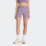Calza corta deportiva de tiro alto, color lila, con cintura elástica ancha que incluye el logo de la marca. Confeccionada en tejido elástico con tecnología de secado rápido.