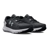 Championes de running Under Armour Charged Rogue 3, color negro con entresuela blanca y detalles plateados. Confeccionados con tejido de punto transpirable y entresuela Charged Cushioning para mayor amortiguación.