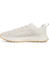Championes urbanos Under Armour modelo Street Mirage, color beige con detalles en blanco. Presentan una parte superior de malla transpirable con superposiciones de gamuza, entresuela de EVA acolchada y suela de goma con agarre.