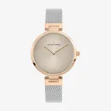 Reloj análogo Jacques Lemans de la línea Milano para dama, con caja de acero en tono oro rosado y esfera color champagne. Posee un brazalete de malla milanesa en tono plateado y corona lateral.