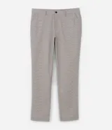 Pantalón de vestir color beige con estampa de cuadros en hilo teñido, corte slim, cintura con trabillas, cierre con botón y cremallera, bolsillos laterales y traseros.