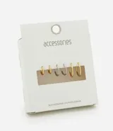Set de tres pares de aros tipo argolla de diferentes tamaños, con acabado en acero inoxidable en tonos dorado y plateado.