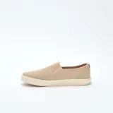 Zapatillas bajas sin cordones color beige de malla con suela blanca.