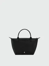 Cartera de mano Longchamp modelo Le Pliage One talla S, color amarillo, con solapa de cuero y cierre de botón a presión, asas cortas de mano y cierre superior con cremallera.
