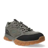 Championes de trekking Topper modelo Grove, color gris con detalles en negro y suela de goma color caramelo. Presentan un diseño robusto con refuerzos en la puntera y laterales, cordones jaspeados y una suela con relieve para mayor tracción.
