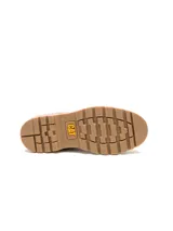 Bota tipo Chelsea Caterpillar modelo Grader, confeccionada en gamuza color marrón. Presenta paneles laterales elásticos, tiradores en la parte superior y suela de goma dentada para mayor tracción.