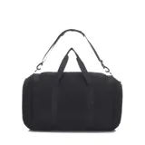 Bolso deportivo tipo duffel bag, color negro, con grandes iniciales 'MH' en el frente en tono gris oscuro. Presenta detalles de franjas horizontales en rojo, amarillo y negro sobre los cierres de los compartimentos. La correa de hombro lleva la inscripción 'NBA' en relieve.