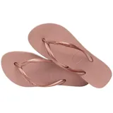 Ojotas Havaianas modelo Slim, color rosado, con tiras finas y suela con textura antideslizante.