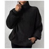 Buzo de polar con textura suave, color beige, con cuello alto y cierre frontal parcial. Diseño de manga larga y calce holgado.