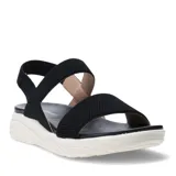 Sandalias de plataforma con tiras elásticas negras en el empeine y talón, base de goma blanca con diseño texturizado y plantilla negra.