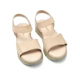 Sandalias bajas color beige con plataforma y dos tiras con velcro.