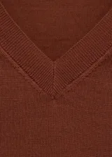 Chaleco de punto de lana 100% color marrón óxido, de manga corta, con cuello en V y ajuste acanalado en el bajo.