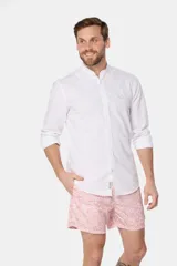 Short de baño celeste con estampado de flores blancas, cintura elástica con cordón ajustable, dos bolsillos laterales y suspensor de malla fina.