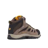 Bota de trekking Columbia Crestwood Mid impermeable, confeccionada en una combinación de cuero gamuzado y malla en tonos marrón y negro, con entresuela amortiguada y suela de alta tracción.