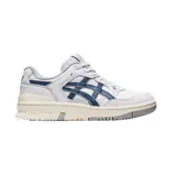 Championes Asics modelo EX89, de diseño retro inspirado en el básquetbol. Presentan una base de cuero blanco con detalles en azul marino en los laterales y una suela de goma con efecto envejecido.