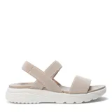 Sandalias de plataforma con tiras elásticas texturizadas en color beige. Presentan una base ergonómica de goma blanca con diseño estriado y plantilla acolchada al tono.