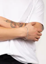 Pulsera de acero quirúrgico plateado con eslabones tipo 3 y 1.