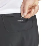 Short de running Adidas modelo Own The Run, color negro. Confeccionado en tejido técnico con tecnología AEROREADY para absorción de humedad, cuenta con cintura elástica con cordón ajustable, bolsillos frontales con cierre y detalles reflectantes.