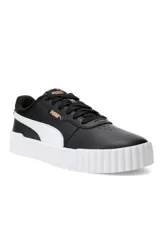 Championes Puma Carina 3.0, modelo deportivo para mujer en color blanco con franja lateral negra y suela de plataforma texturizada.
