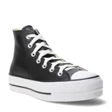 Championes de caña alta Converse modelo Chuck Taylor Lift, con capellada de cuero sintético negro, cordones blancos y suela de plataforma de goma blanca con puntera reforzada.