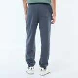 Pantalón de jogging azul marino de corte recto con cordones ajustables en la cintura.