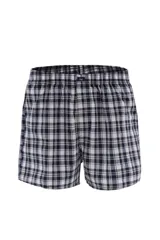 Calzoncillo tipo bóxer de tela a cuadros en tonos blanco, negro y gris, con cintura elástica y logo en el centro.