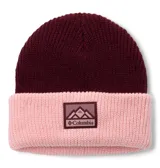 Gorro de lana tejido con diseño bicolor, presentando una parte superior en color bordó y un borde doblado en color rosado. Incluye un parche frontal con el logo de la marca Columbia.
