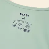 Musculosa deportiva Kiabi de corte fluido y diseño cropped, con cuello redondo y sisas amplias.