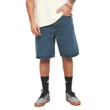 Bermuda de denim azul Quiksilver modelo Fast, de corte holgado y diseño clásico de cinco bolsillos.
