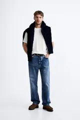 Jersey de algodón de punto, color rosa pálido, con cuello redondo y manga corta, corte relajado.