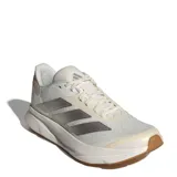 Championes de running Adidas modelo Duramo SL 2, color blanco con detalles en gris y suela de goma color caramelo. Presentan capellada de malla transpirable y mediasuela con tecnología LIGHTMOTION para mayor amortiguación.