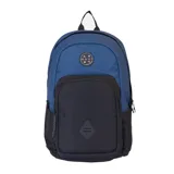 Mochila Maui and Sons modelo Explorer, color azul con base y bolsillo frontal negros. Tiene un parche circular con el logo de la marca en la parte superior y un parche de goma con un diseño geométrico en el bolsillo frontal. Cuenta con un compartimento principal, un bolsillo frontal con cierre y bolsillos laterales de malla.