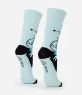 Par de medias de algodón color celeste, con diseño de Rosita la Robot de Los Supersónicos. Tienen puño ajustado para una mejor fijación.