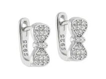 Par de caravanas de plata 925 con diseño de moña y circonias. Cierre catalán.