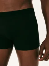 Pack de dos calzoncillos bóxer largos, uno negro y otro azul marino, confeccionados en algodón y elastano, con elástico personalizado en la cintura.