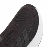 Championes deportivos Adidas modelo Cloudfoam Cuxxion, de diseño slip-on sin cordones, color negro con suela blanca de plataforma con tecnología Cloudfoam.