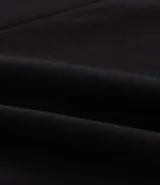 Blazer marrón de crepé de viscosa, corte alargado, sin cierre y mangas fruncidas.