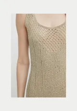 Vestido midi color beige de punto calado con aberturas, breteles anchos y combinación interior al tono.