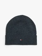 Gorro tipo beanie de punto con vuelta, confeccionado en mezcla de algodón y cachemira. Presenta un diseño jaspeado en tonos azul oscuro y negro, con el logo de la marca bordado en la parte frontal.