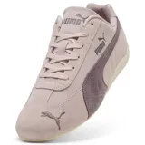 Championes Puma Speedcat OG color rosa claro con detalles en gris oscuro.