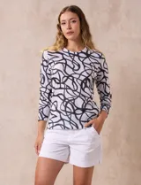 Buzo blanco estampado con cuello a la base y mangas tres cuartos, marca Milano.