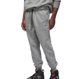 Pantalón de jogging Jordan Essential color gris melange, con cintura elástica ajustable mediante cordón, bolsillos laterales y puños elásticos en los tobillos. Presenta el logo Jumpman bordado en la parte superior izquierda.
