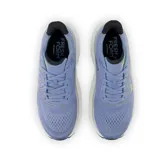 Championes de running New Balance Fresh Foam X More v4, color celeste con detalles en gris y verde flúor.