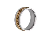 Anillo de acero italiano con banda central giratoria con baño de oro.