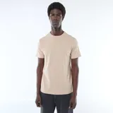 Remera lisa de manga corta y cuello redondo, de corte recto y color beige.