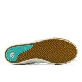 Championes de skate New Balance Numeric 306, modelo profesional de Jamie Foy. Diseño en color beige con logo lateral en turquesa, confeccionados en gamuza ligera y paneles de malla transpirable. Presentan suela vulcanizada de perfil bajo con refuerzo de goma visible.