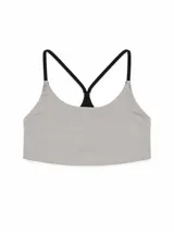 Top deportivo de color gris claro con breteles finos negros en diseño de espalda cruzada.